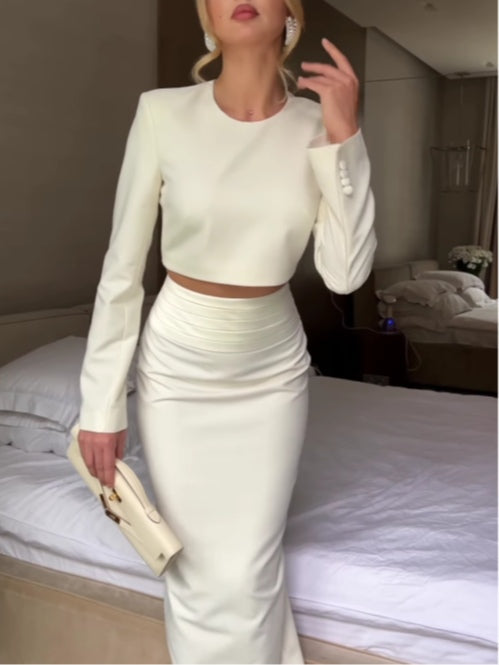 White long-sleeved top and skirt suit
