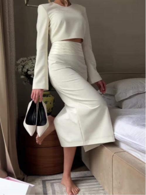 White long-sleeved top and skirt suit