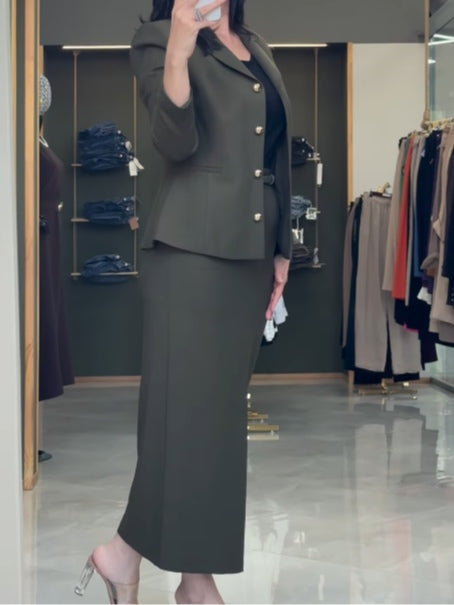 Olive green suit jacket and skirt commuter suit
