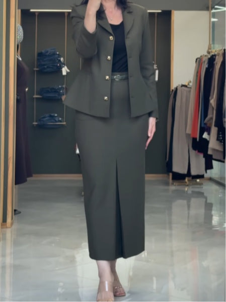 Olive green suit jacket and skirt commuter suit